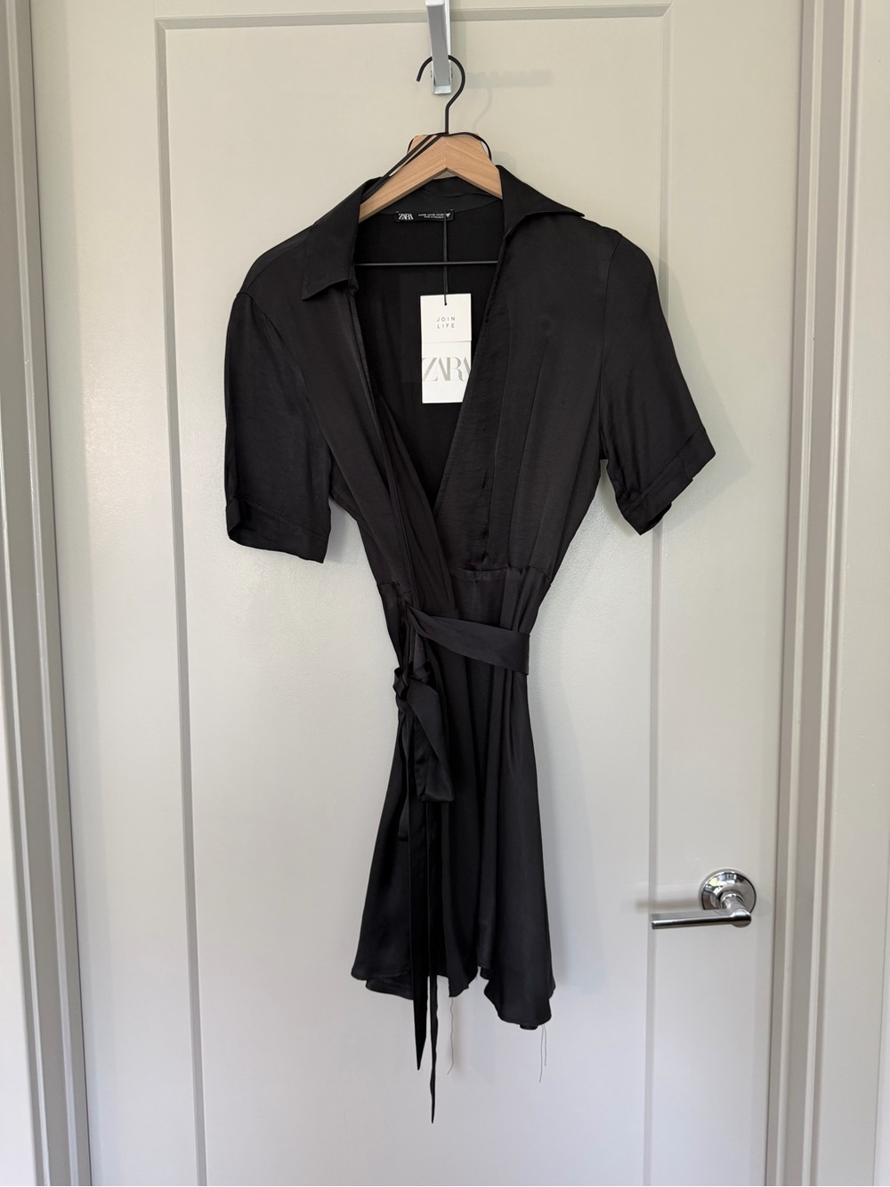 Women’s black belted mini dress